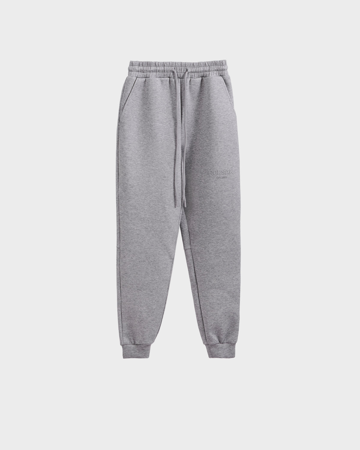 The Rudsak JOSS - 9524009 Heather Grey W joggers feature premium cotton, an elastic waistband with drawstring, side pockets, and cuffed ankles, shown against a plain white background.
