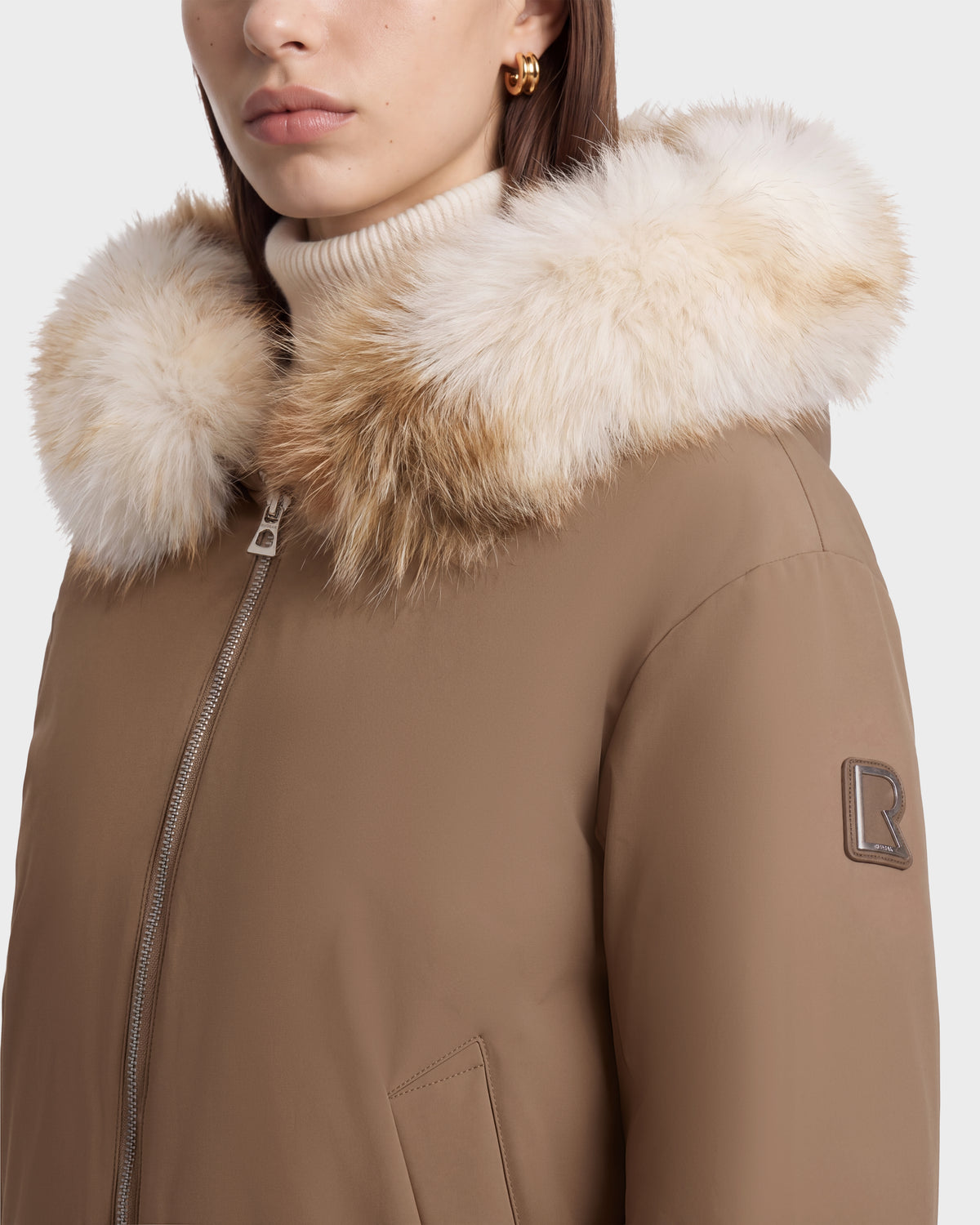 Sand KATHLEEN - 8126764 recycled nylon winter bomber jacket with a fur-trimmed hood and an R logo patch on the sleeve.