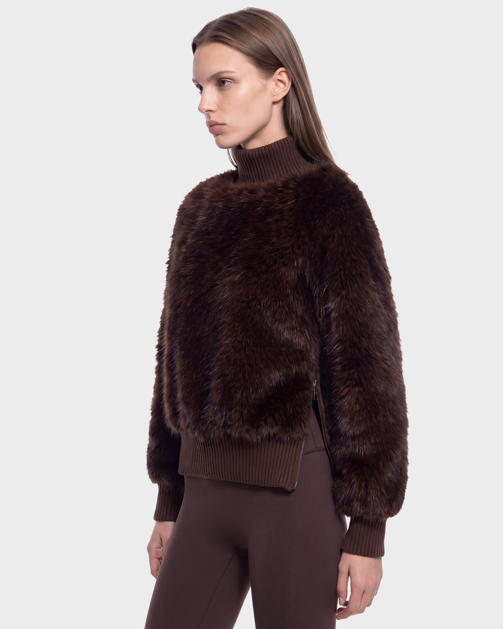 Rudsak LAYLA F - 8525630 Mix Expresso long-sleeved dark brown faux fur turtleneck with a cable textured finish, ribbed hem, and side zippers.