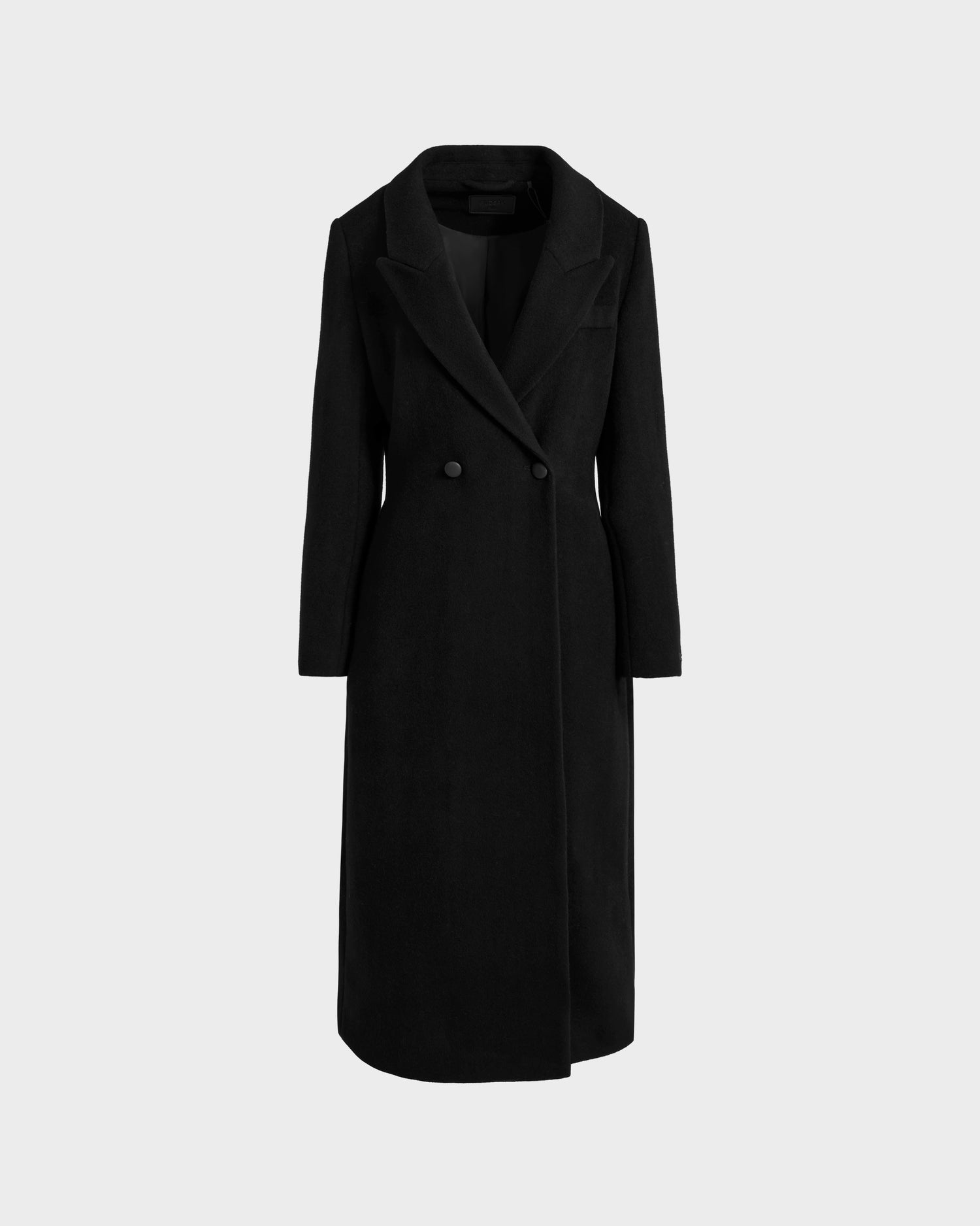 The Rudsak LYNWOOD - 8125539 Black is a women’s long tailored coat in premium wool, featuring a notched lapel, straight silhouette, and double-breasted design, shown on a plain light gray background.
