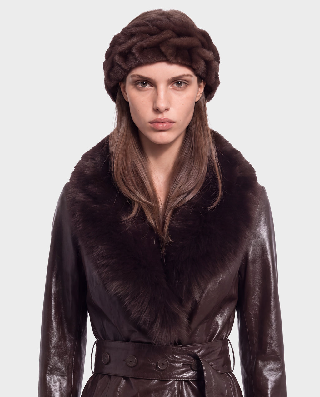 A model wearing the MILA - 8426518 Espresso coat, featuring a wide fur collar, paired with a matching dark brown fur headband.