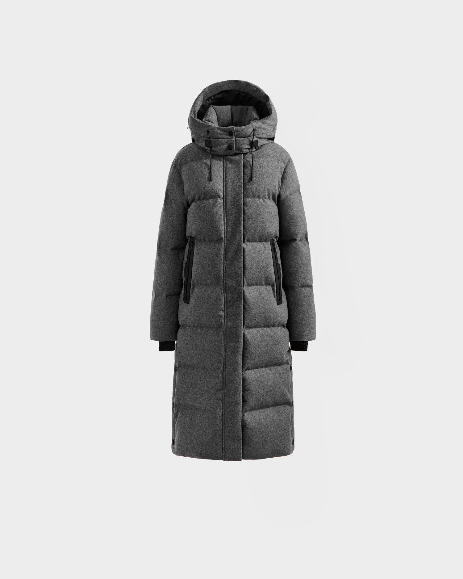 The Rudsak MAO W - 8125568 Heather Charcoal is a long, dark gray puffer coat with a hood, front zipper, and side pockets, shown against a plain light background.