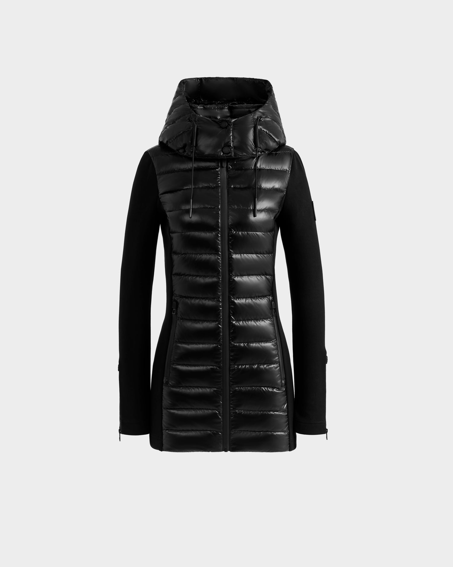 The Rudsak MARRY S - L125521 Black is a weather-resistant, black puffer jacket with a glossy shell front, matte long sleeves and sides, and a hood, displayed against a plain light gray background.