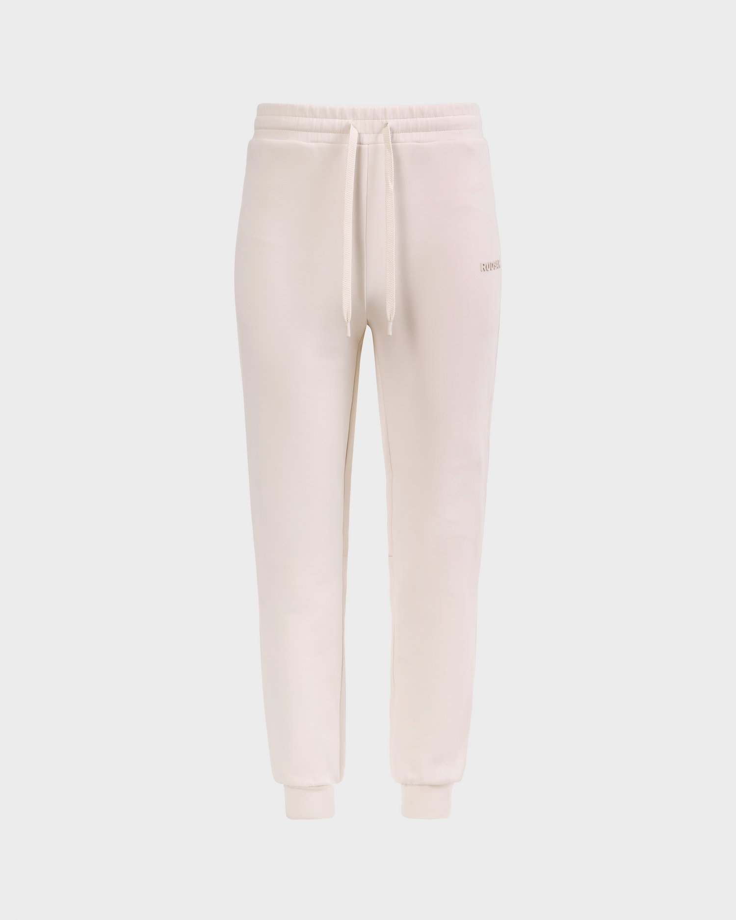 The MAXTON - U525007 Vanilla M jogger sweatpants by Rudsak feature a cream cotton blend, elastic waistband with drawstring, and cuffed ankles for everyday comfort. Shown on a plain white background.