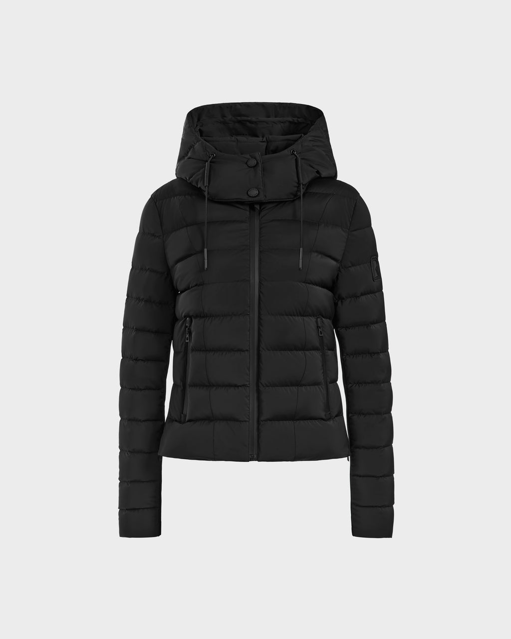The Rudsak MELISSA - 8125054 is a black, quilted womens puffer jacket with a hood, front zipper, long sleeves, and zippered side pockets. The water-resistant jacket is shown against a plain light gray background.