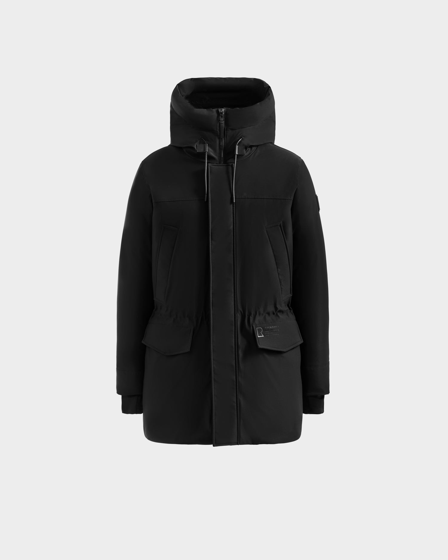 The Rudsak MITCHELL - M125513 Black men’s down parka features a front zipper, large flap pockets, and an adjustable waist with RDS-certified down, shown on a plain light gray background.