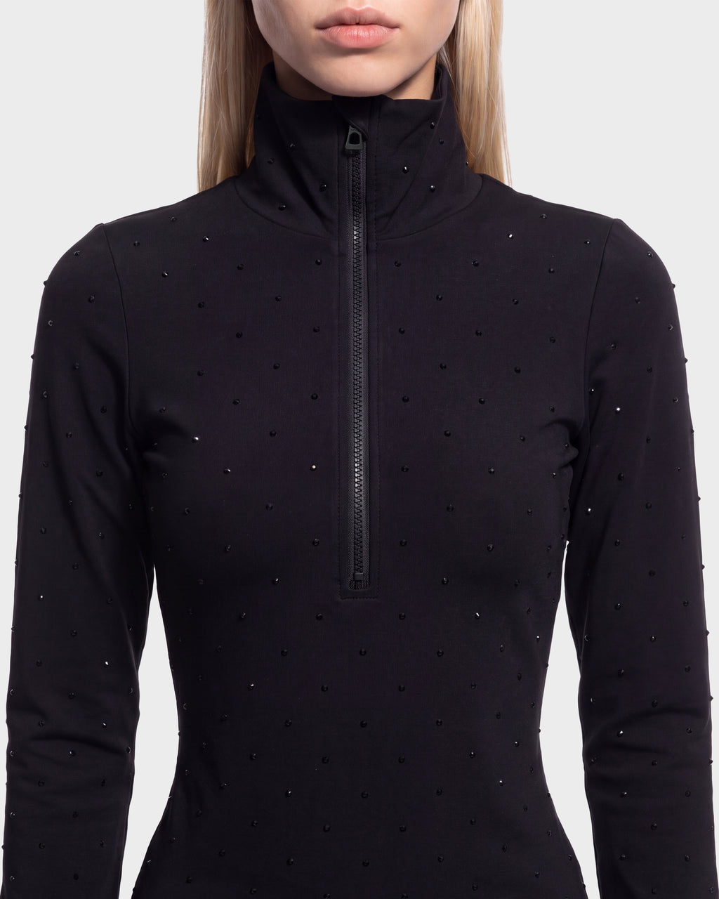 Rudsak NEVA - 8526524 Black fitted long-sleeve top with a high collar, front zipper, and scattered small embellishments.