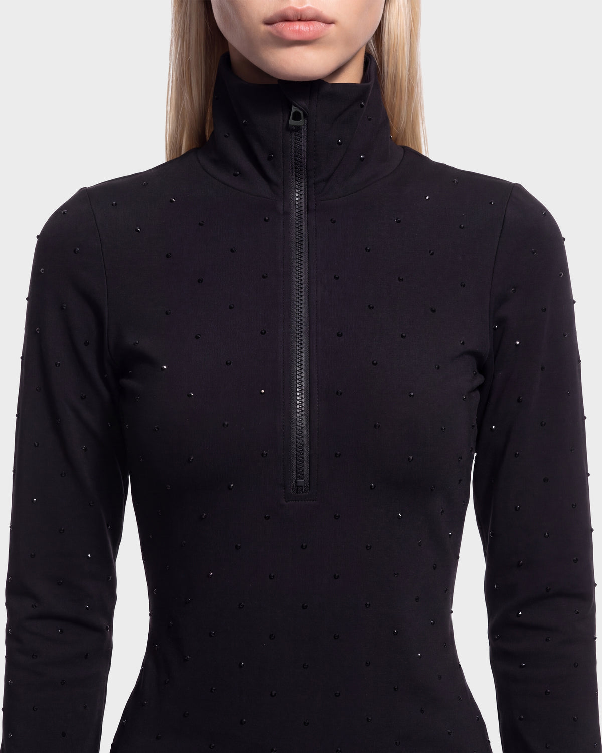 Rudsak NEVA - 8526524 Black fitted long-sleeve top with a high collar, front zipper, and scattered small embellishments.