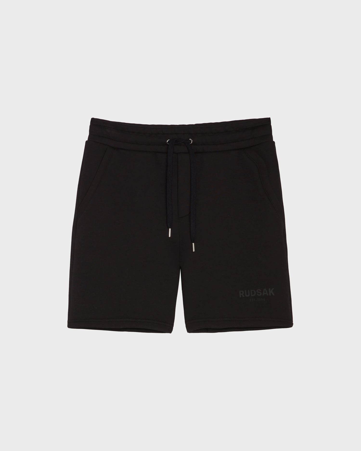 PASCAL - 6524022 Black mens double jersey shorts by Rudsak, featuring a stretch comfort waistband, side pockets, and subtle branding on the left leg, shown laid flat on a white background.