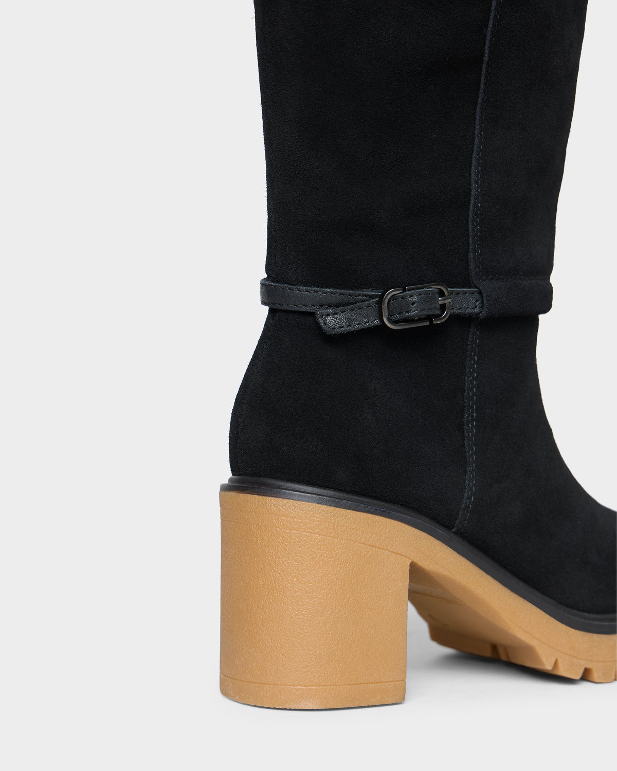 Rudsak STEPRA - 8226524 Black knee-high boot featuring a thin buckled ankle strap, a thick light-brown block heel, and a lugged sole.