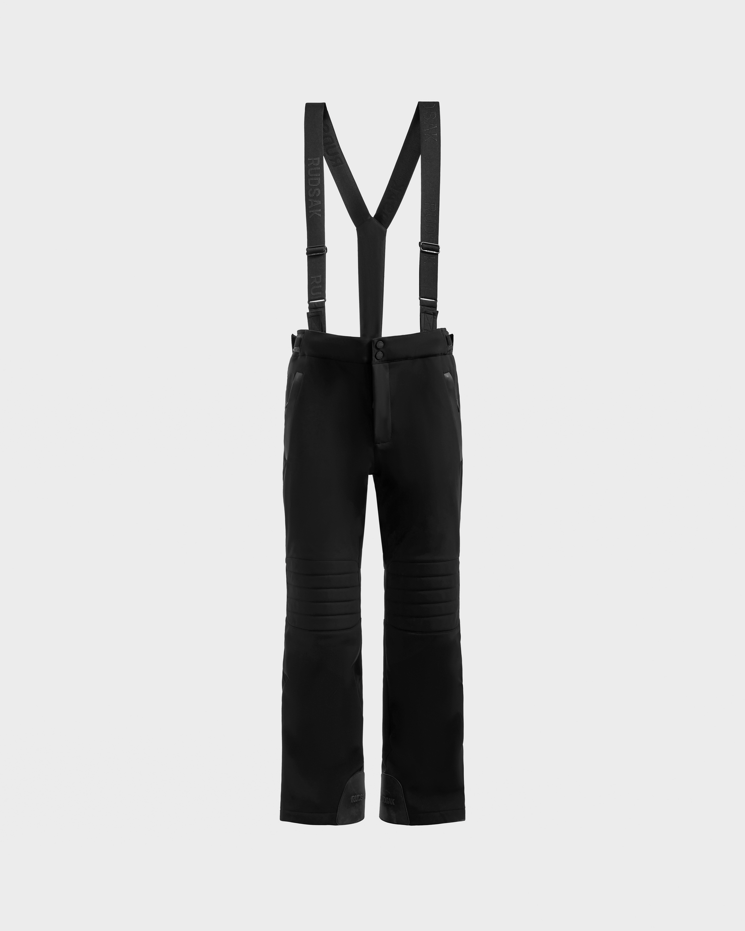The Rudsak SAMPSON - 6125586 Black men’s performance snow pant features adjustable suspenders, front zipper, waterproof zippers, and reinforced knees, displayed on a plain light gray background.