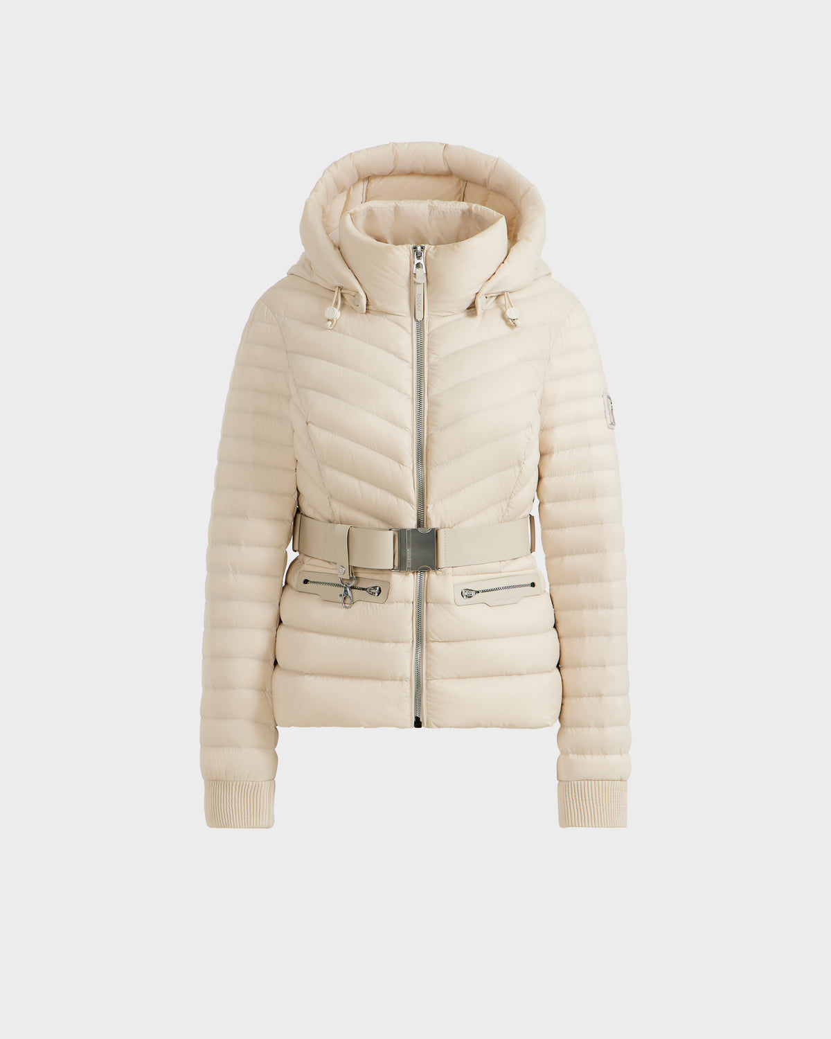 The Rudsak SCARLETT - 8125004 Vanilla is a women’s cream-colored, quilted lightweight down jacket with a hood, zip front, ribbed cuffs, and a vegan leather waist belt with silver buckle, shown on a plain white background.