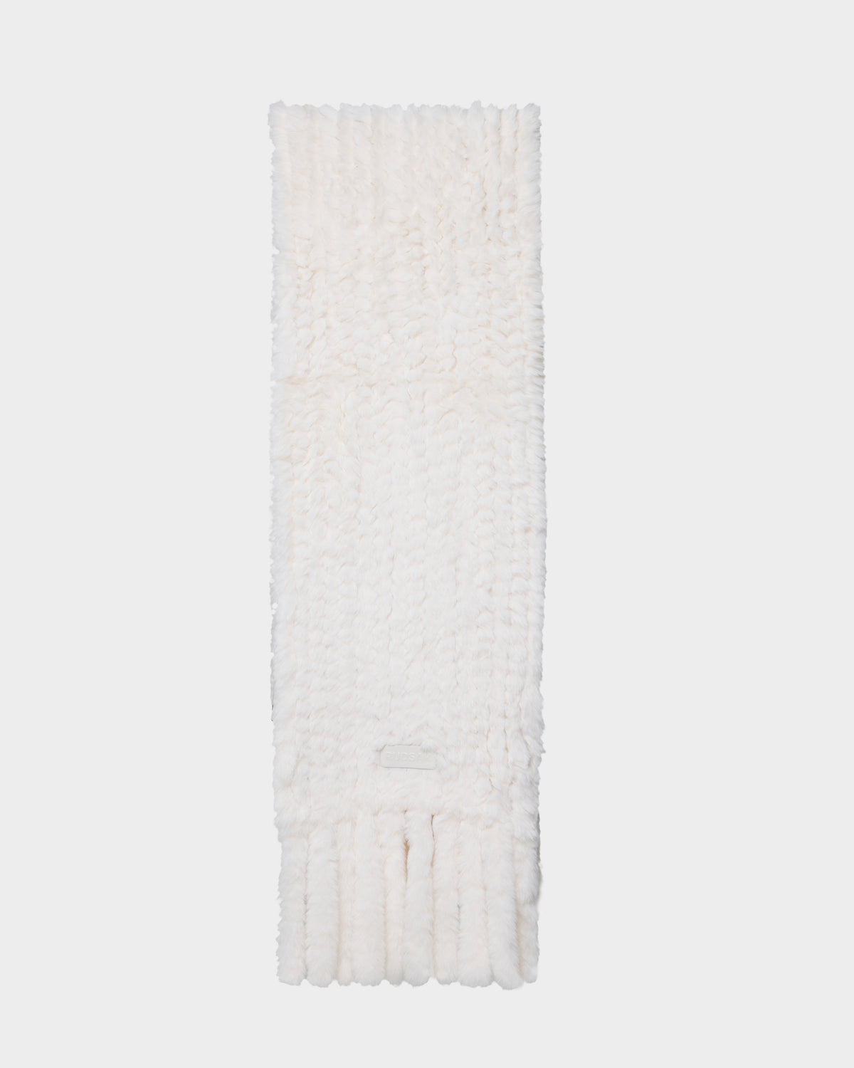 A long, rectangular TAVIA - 8426511 Vanilla scarf by Rudsak, featuring a fluffy white textured pattern, is folded neatly on a plain light background.