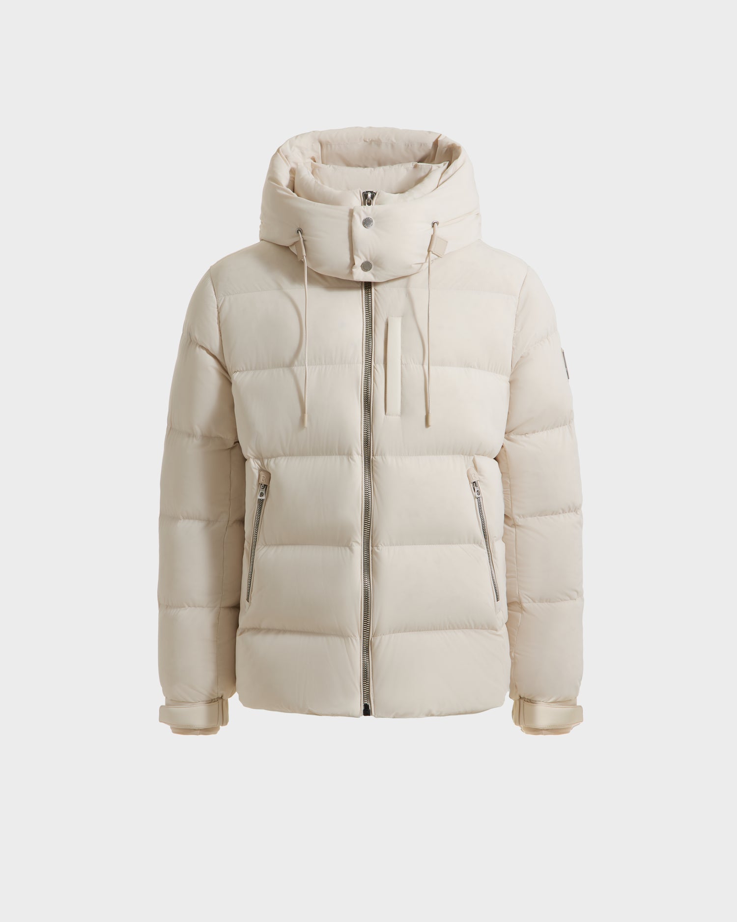 The Rudsak VINCE M - 6124561 Vanilla is a cream mens down puffer jacket with RDS-certified down, high collar, hood, front zipper, zippered side and chest pockets, and adjustable cuffs, shown on a white background.