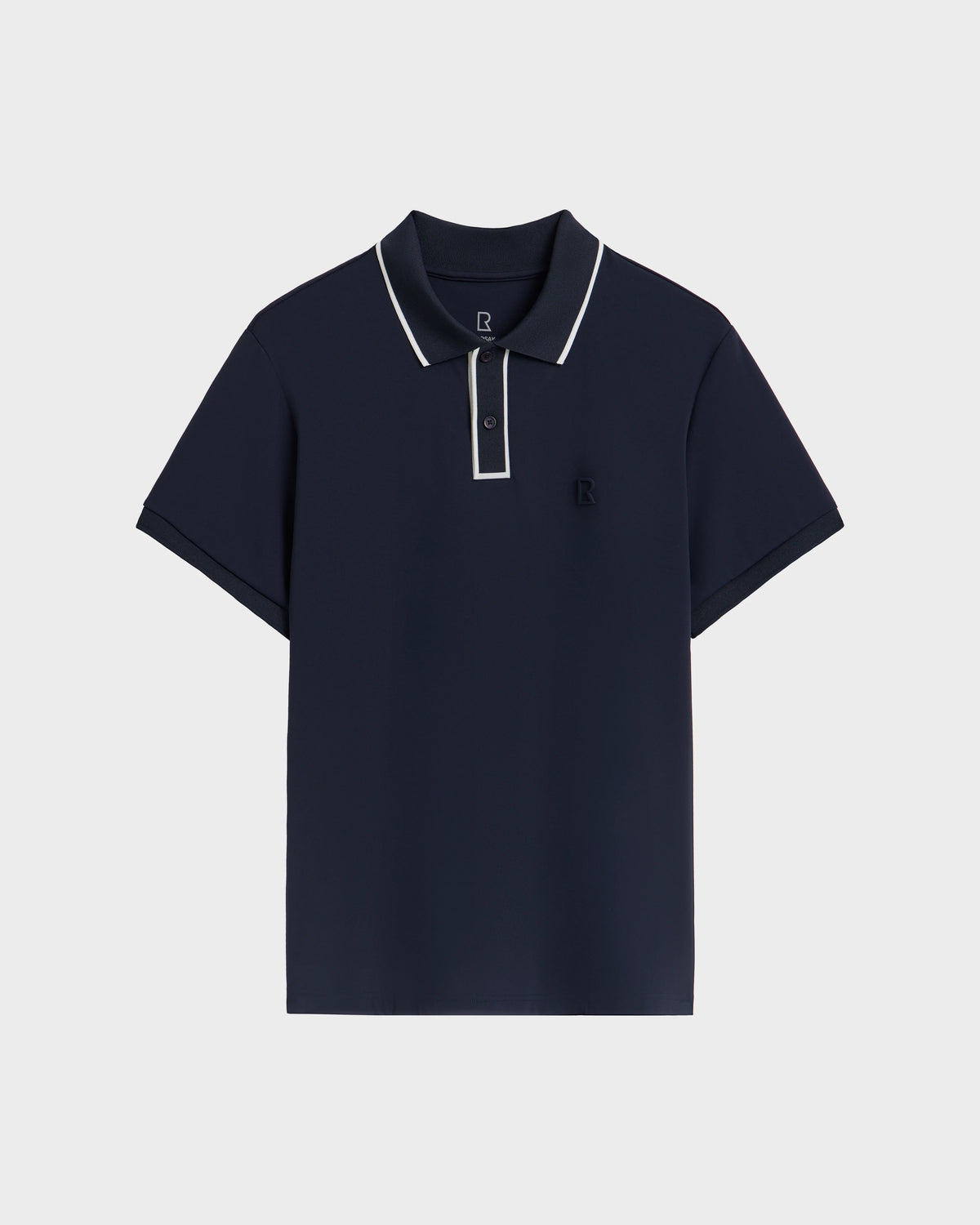 The Rudsak XAVIER - 6524027 Navy mens polo features white trim on the collar and placket, a small chest logo, and is shown on a plain white background.