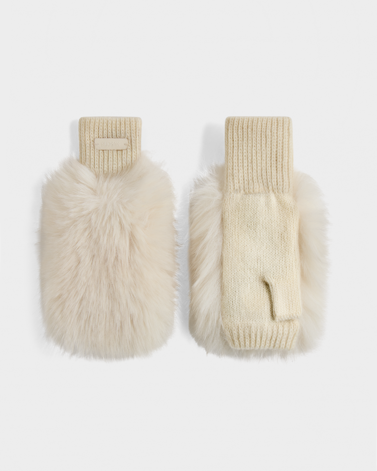 The Rudsak LIA - 8425007 Vanilla are women’s cream fingerless mittens, featuring faux fur on the outer side and wool-blend knit on the palm and cuffs, shown on a white background.